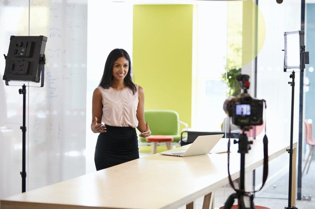 Young woman making a corporate demonstration video